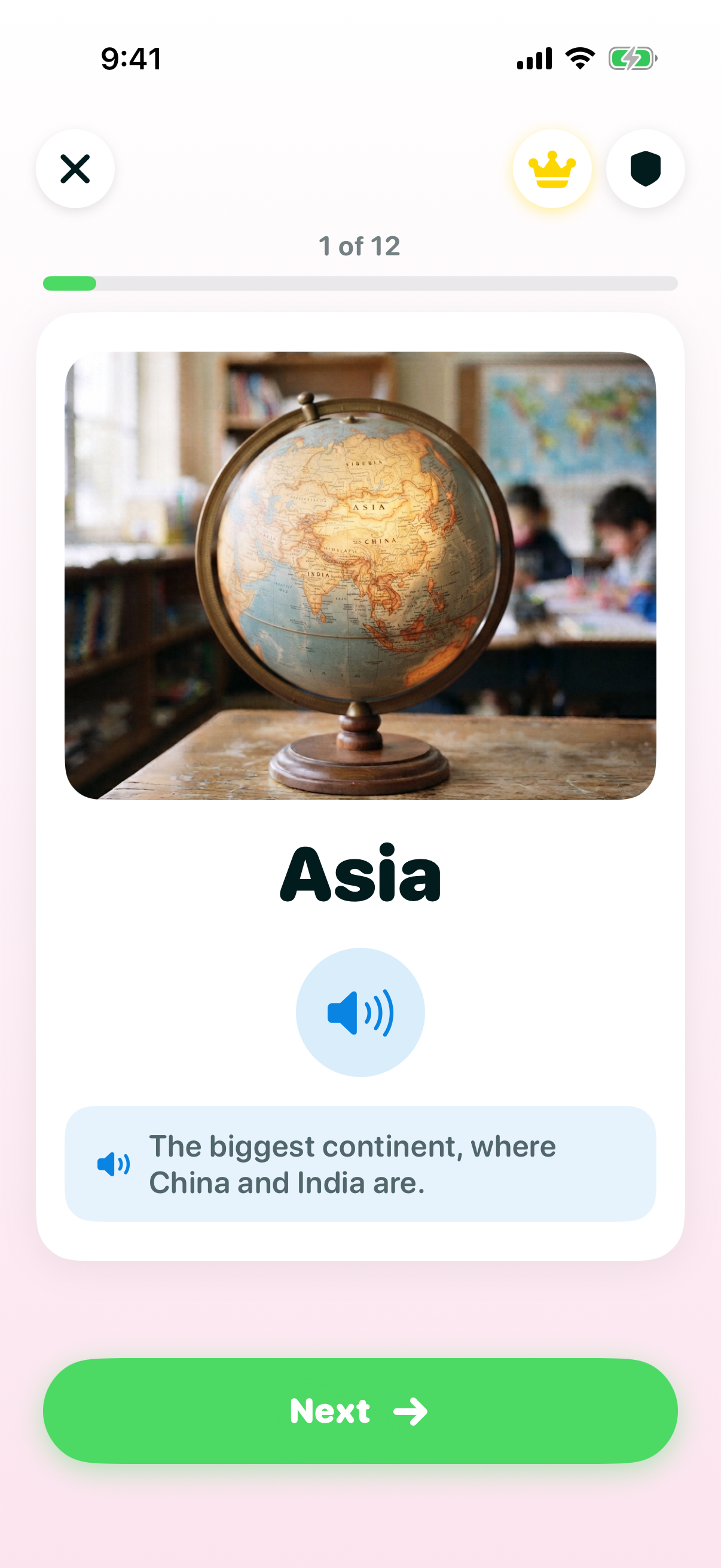 General Knowledge lesson screen showing a desk globe turned to Asia, with the word Asia and a read-aloud fact